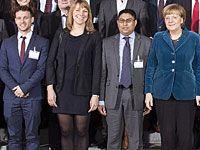 Асаф Цахор на международный форуме, организованном канцлером Германии Ангелой Меркель 