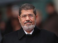Правозащитники: процесс Мурси - незаконный спектакль