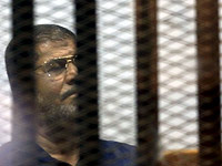 Мухаммад Мурси в суде. Июнь 2015 года