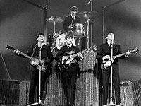 Британские ученые раскрыли секрет популярности The Beatles: песни о погоде  