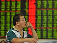 Продолжается обвал на китайском рынке ценных бумаг