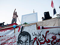 Лидеры "Братьев-мусульман" во время протеста на площади Рабаа в августе 2013 года