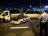 На месте теракта в Бейт-Ханине. 3 августа 2015 года  