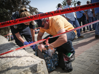 На месте теракта в Иерусалиме. 12 октября 2015 года