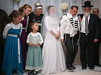 Сотни израильтян пришли на свадьбу дочери Яакова Литмана, убитого террористами