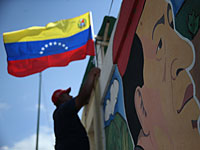 "Праздник демократии" в Венесуэле: поражение "чавистов" на фоне падения цен на нефть  
