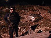 На месте теракта возле поселения Авней Хефец. 9 декабря 2015 года