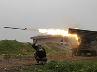 Пуск ракет реактивной системой залпового огня калибра 122 мм "Град" (архив, фотография из Сирии, не из Газы)