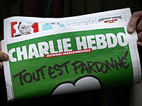 К годовщине нападения на редакцию Charlie Hebdo на обложке журнала появится Бог с "Калашниковым"  