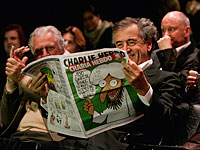 Карикатурист Charlie Hebdo подал в суд на Бернара-Анри Леви, обвинившего его в антисемитизме