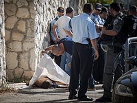 На месте теракта  в иерусалимском районе Армон а-Нацив. 17 октября 2015 года