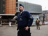 Полицейский у здания Европарламента в Брюсселе