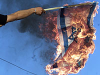 В Бабьем Яру сожгли израильский флаг
