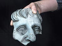 Фрагмент головы статуи