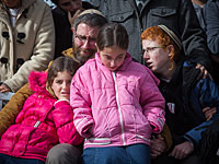 Муж и дети Дафны Меир на ее похоронах. 18 января 2016 года