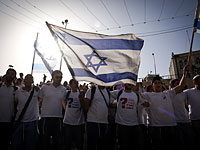 Десятки тысяч израильтян принимают участие в Марше с флагами в Иерусалиме  