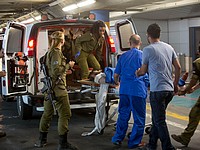 Раненого в результате теракта в Гуш-Эционе доставили в больницу "Шаарей Цедек". 9 июля 2016 г.