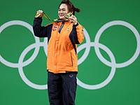 Тяжелая атлетика: спортсменка из Таиланда завоевала золотую медаль и установила рекорд 