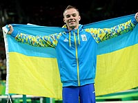 Упражнения на брусьях: олимпийским чемпионом стал украинец Олег Верняев