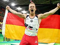 Упражнение на перекладине: олимпийским чемпионом стал немец