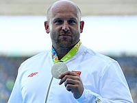 Польский легкоатлет выставил серебряную олимпийскую медаль на аукцион, чтобы помочь больному ребенку