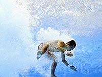 Прыжки в воду: золото завоевал китаец