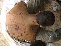Британский таблоид опубликовал фото из провинции Ачех:  избиение нарушителей шариата
