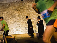 Полиция задерживает "харедим" пытающихся сорвать Иерусалимский марафон