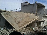 Один из сирийских городов после бомбардировки