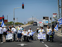 Демонстранты на инвалидных колясках перекрыли дорогу на въезде в Иерусалим