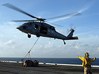 В операции участвуют девять кораблей ВМФ, пять военных самолетов и два вертолета