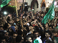 Демонстрация сторонников ХАМАСа в Рамалле в июле 2014-го, во время проведения Израилем операции "Нерушимая скала" в Газе