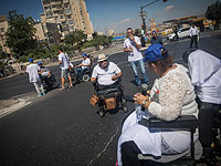 Активисты движения за права инвалидов блокировали мост на въезде в Иерусалим