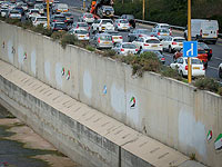 Неизвестный художник "украсил" граффити с гробами русло реки Аялон