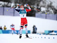 Олимпийским чемпионом в скиатлоне (15 + 15 км) стал норвежский лыжник Симен Хегстад Крюгер