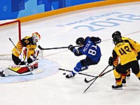 Хоккей: сборные Германии и Финляндии вышли в четвертьфинал
