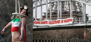 FEMEN против визита Роухани в Париж: обнаженная и повешенная приветствовала "палача свободы"