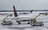 Снежный буран в США: отменены тысячи авиарейсов