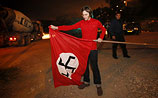 Израильтянин, поднявший нацистский флаг - родственник жертв террора